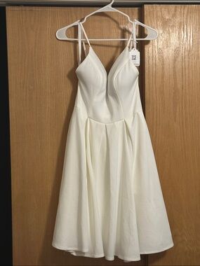 Elegant White Spaghetti-Strap Mini Dress